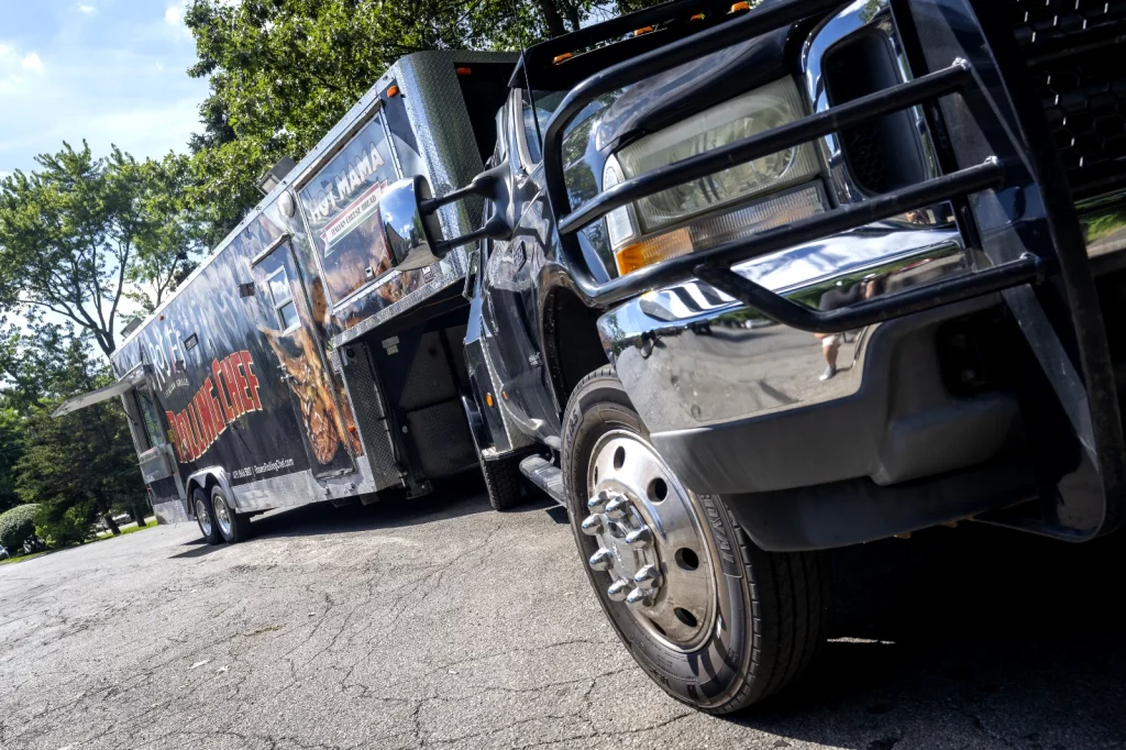 2013 Ford F450SD Flatbed Truck with Black Food Trailer